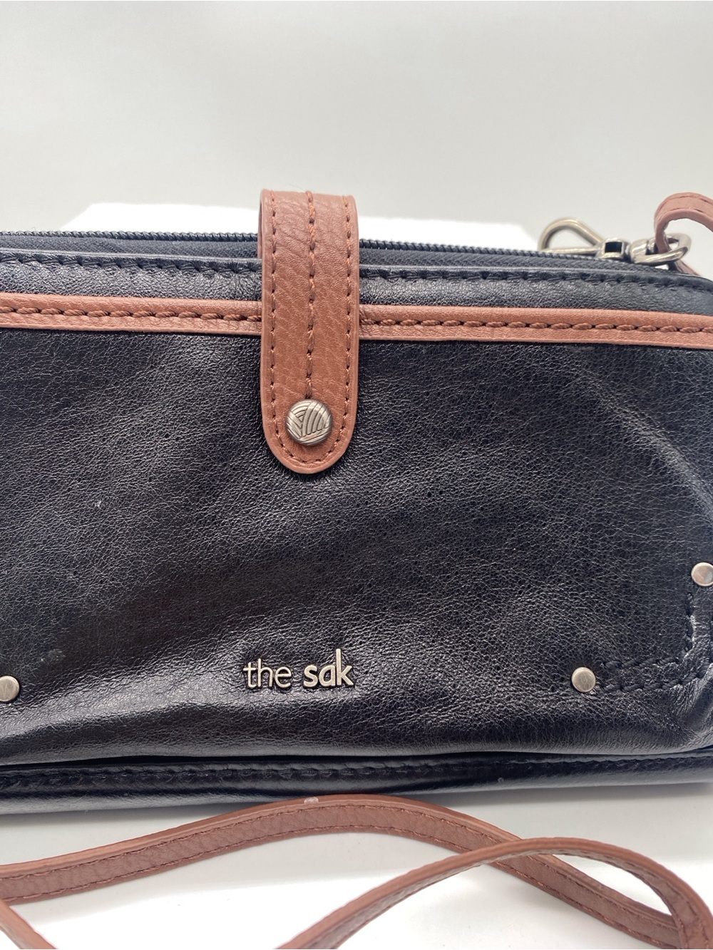 The Sak Black and Brown Leather Crossbody Bag
